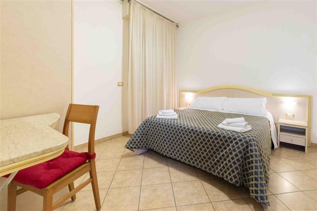 Aparthotel Residenza Melucci Rímini Habitación foto