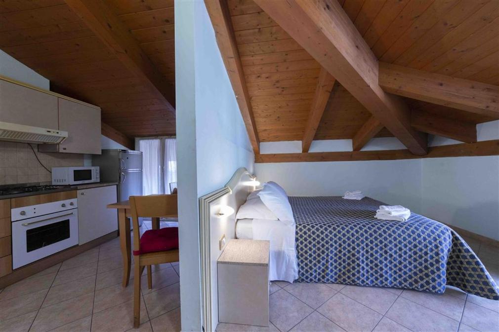 Aparthotel Residenza Melucci Rímini Habitación foto